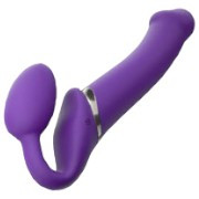 Strap-on vibrator, vibrator harnesses